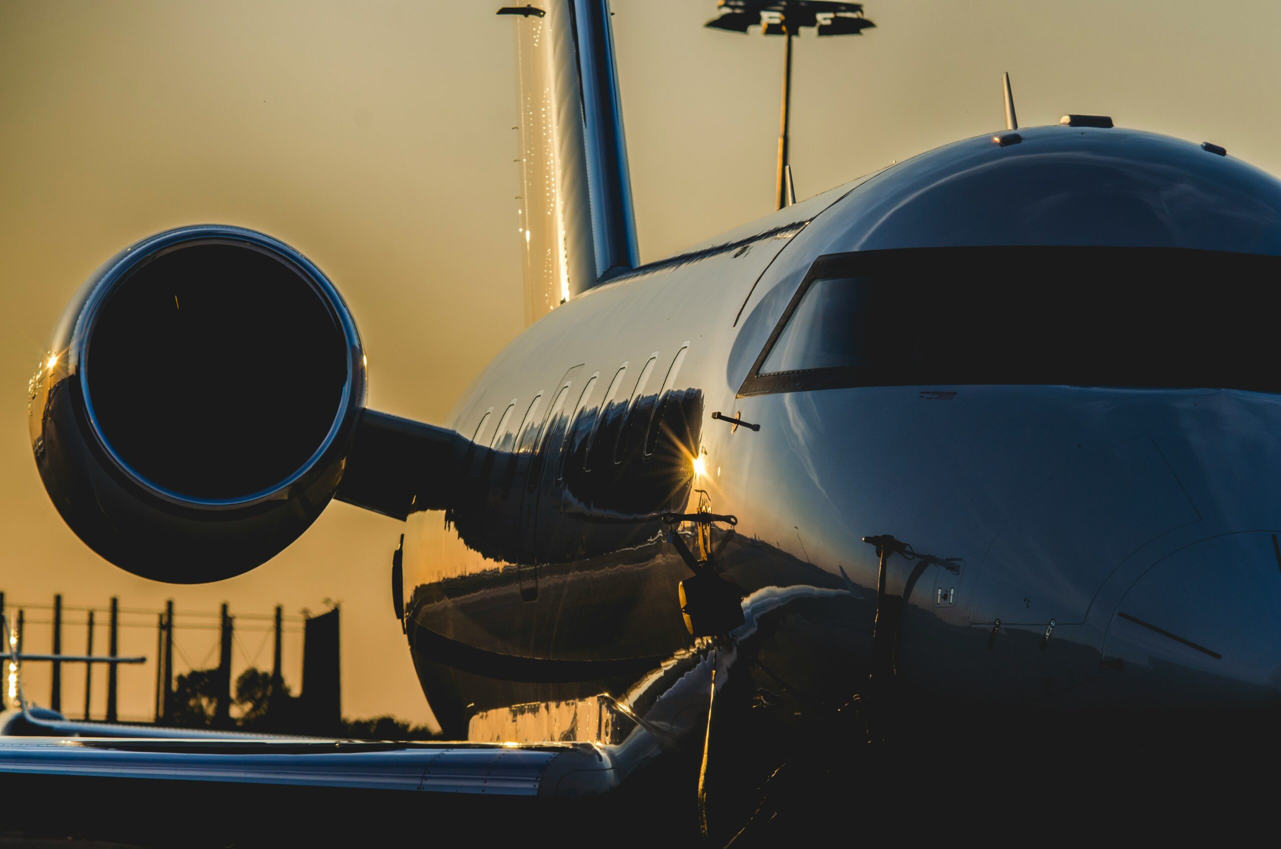 Private jet parked at sunset highlighting luxury aviation experience