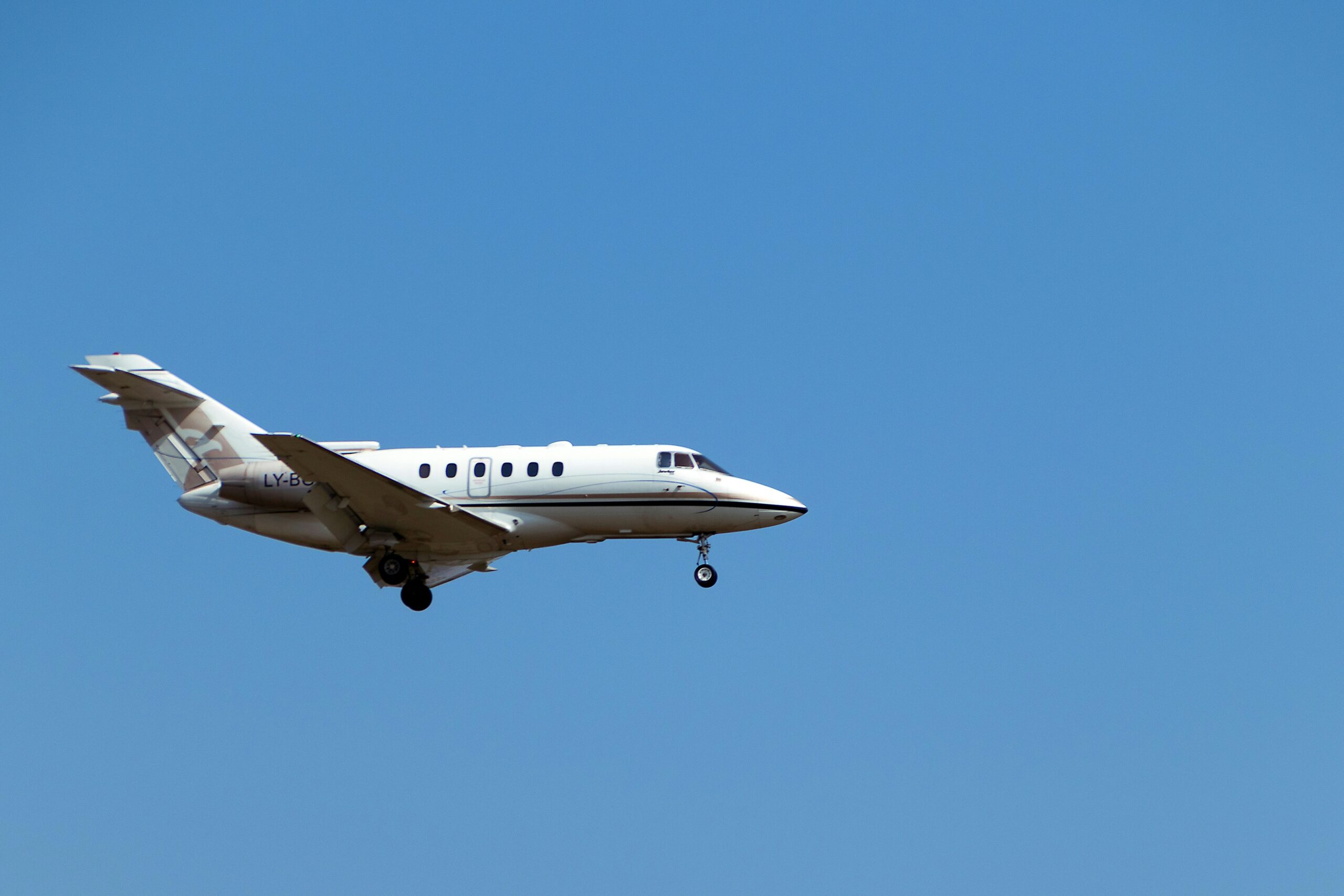 Private jet in flight representing flexible private aviation travel options