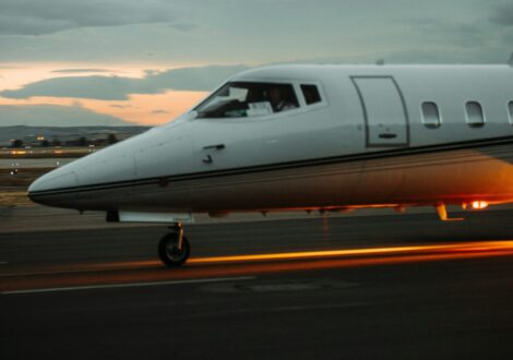 Private jet preparing for departure on the runway during a private jet charter flight.