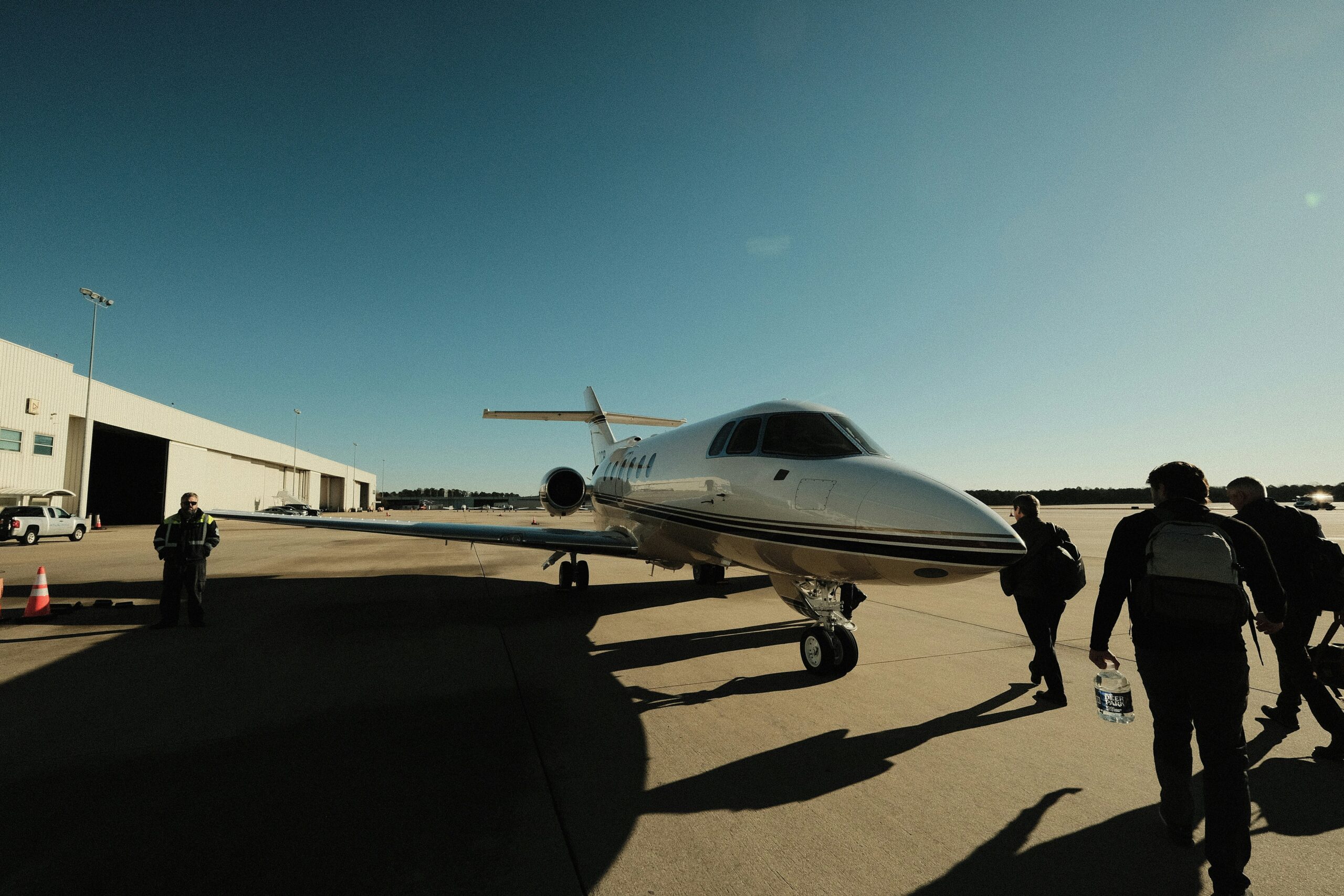 Passengers boarding a private jet at the airport